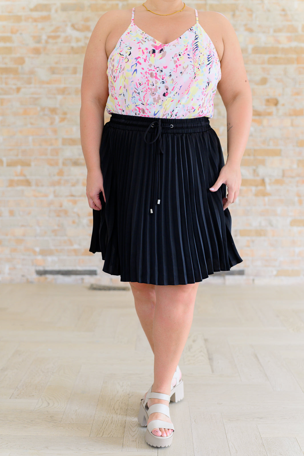 Just a Flirt Pleated Skirt in Black Bottoms Ave Shops