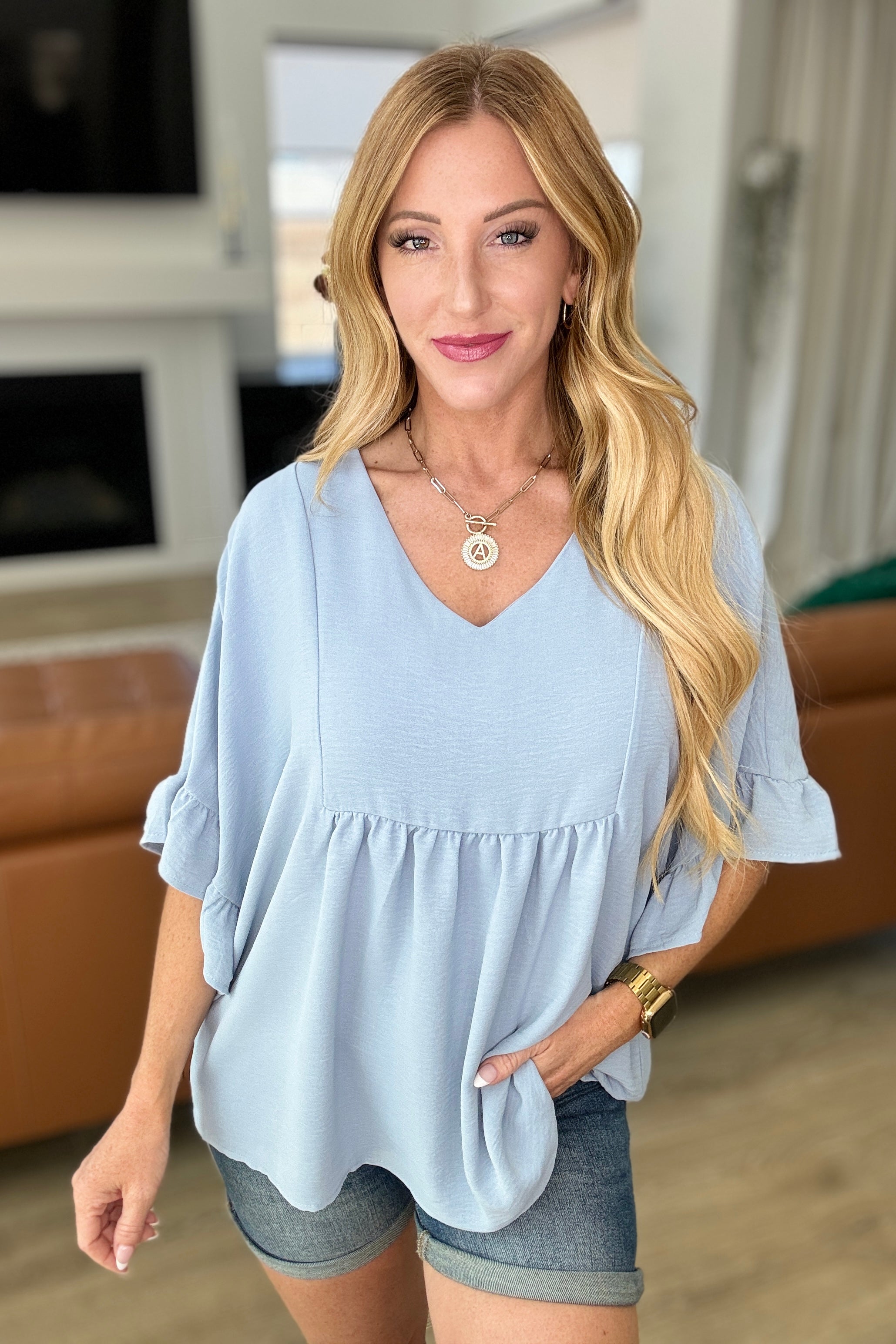 Airflow Peplum Ruffle Sleeve Top in Chambray Tops Ave Shops   